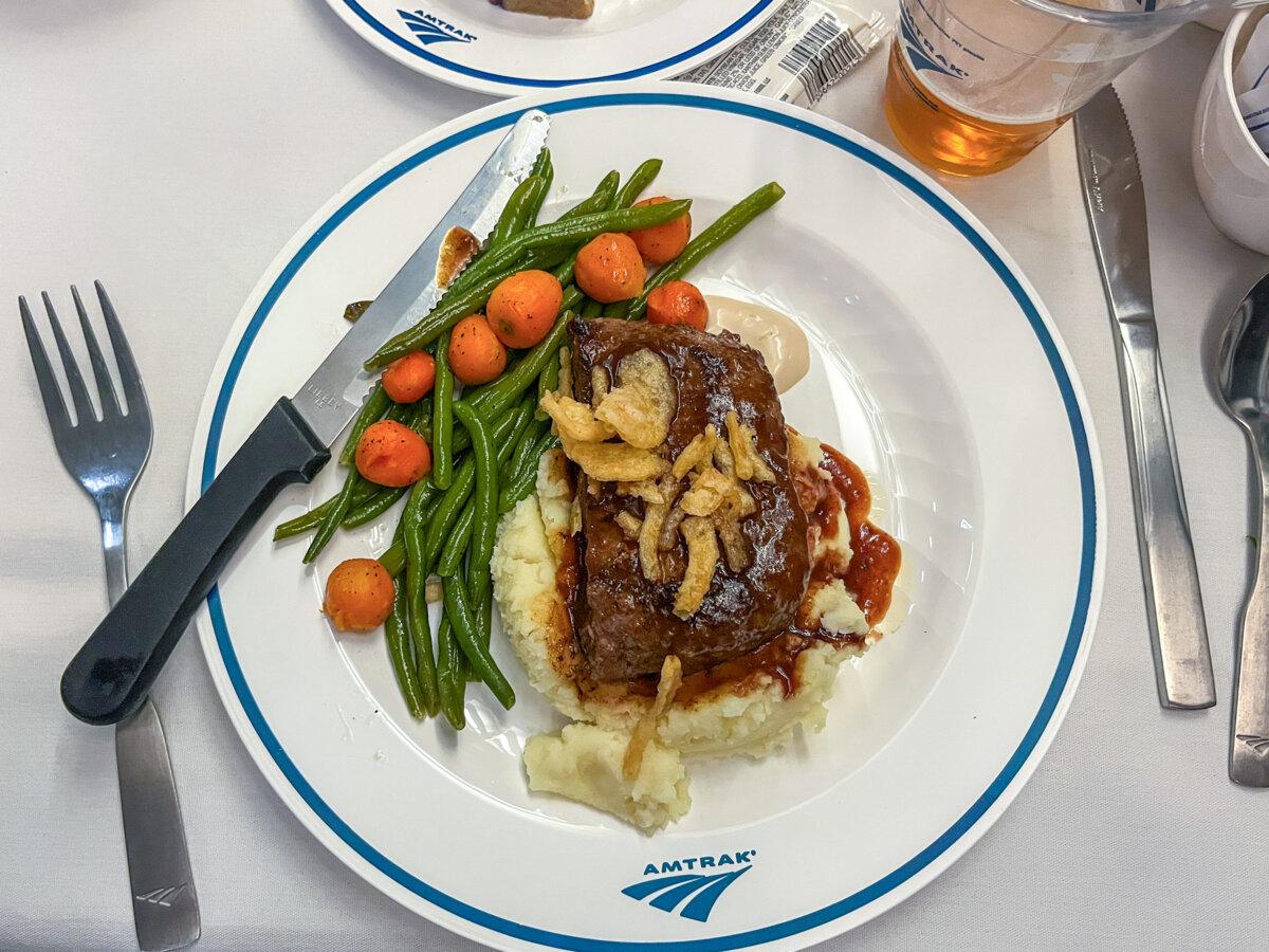 A meal is served in the dining car of Amtrak's Southwest Chief train from Los Angeles to Chicago. (Christopher Reynolds/Los Angeles Times/TNS)