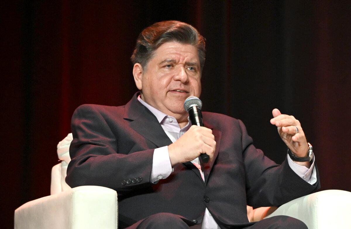 Illinois Gov. JB Pritzker speaks on stage at The Chicago Theatre on Nov. 12, 2025. (Daniel Boczarski/Getty Images for Vox Media)