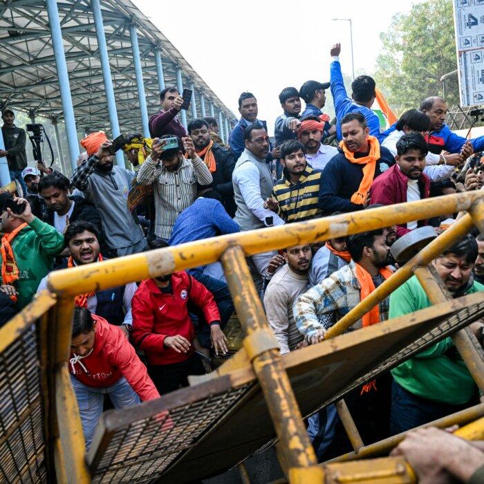 Day in Photos: Protests in India, House Explosion in Paris, and Christmas Ballet in Kenya