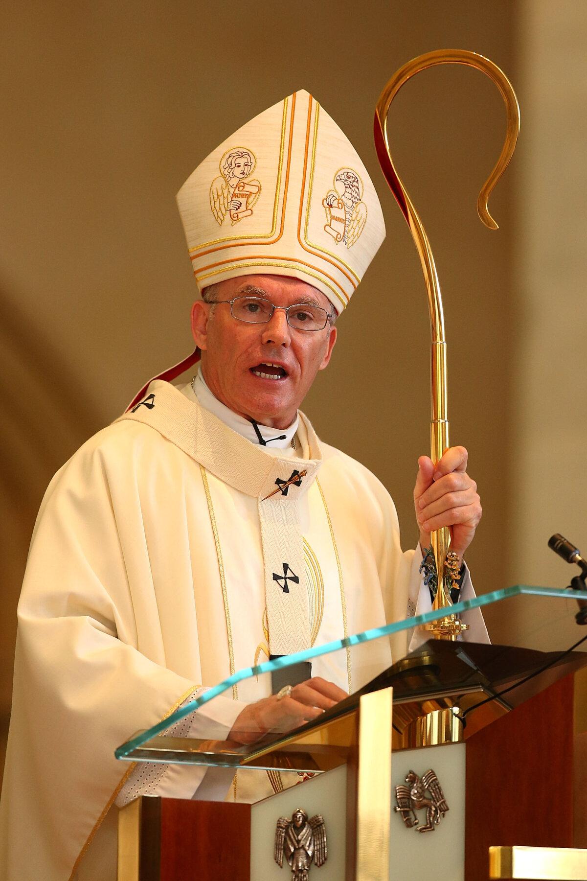 Rev Timothy Costelloe, Archbishop of Perth, conducts a memorial service for victims of the MH17 disaster at St Mary's Cathedral in Perth, Australia, on July 25, 2014. (Paul Kane/Getty Images)