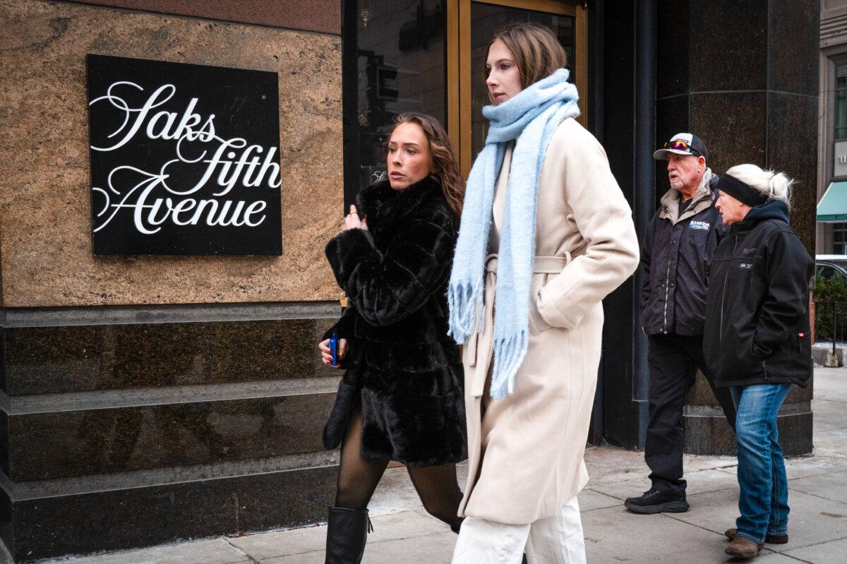 Saks Global Files for Bankruptcy Protection a Year After Neiman Marcus Deal Pedestrians walk past a Saks Fifth Avenue store in Chicago on Dec. 30, 2025. (Scott Olson/Getty Images)