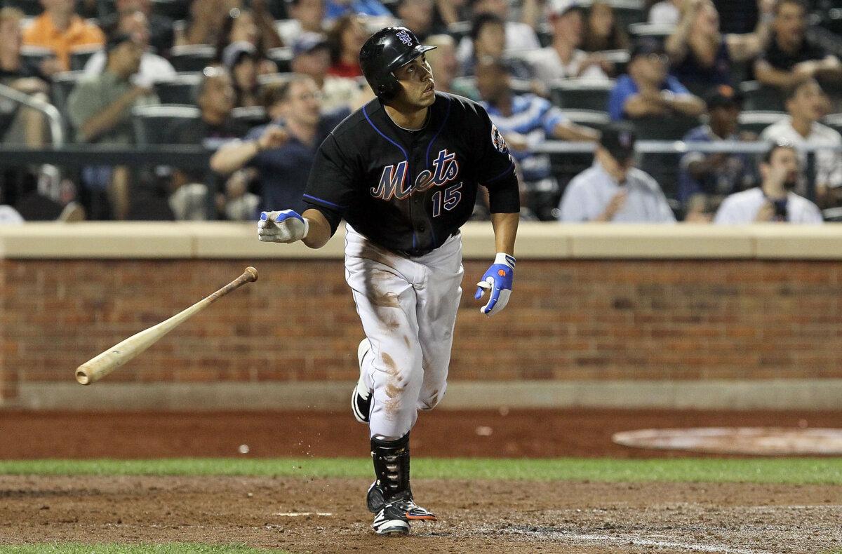 Carlos Beltran of the New York Mets hits a game-winning walk-off sacrifice fly against the Arizona Diamondbacks at Citi Field in the Flushing neighborhood of the Queens borough of New York City on July 31, 2010. (Jim McIsaac/Getty Images)