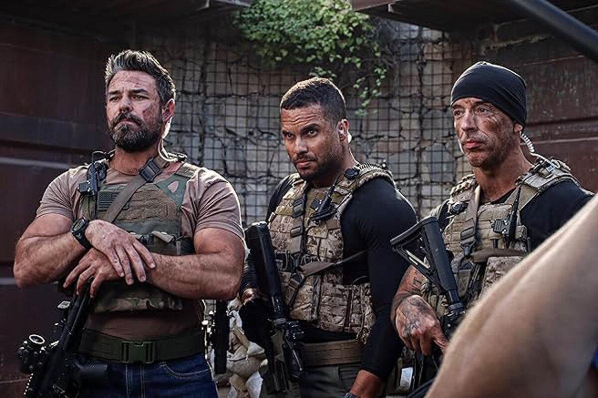 (L–R) Evan Lee (Jesse Hutch), Bing (Emmanuel McCord), and Tick (Kevin Lawson) pull security duty, in “Homestead: The Series.” (Angel Studios)