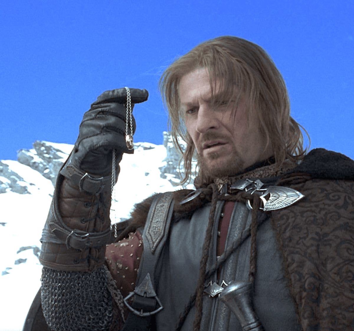 Boromir, son of Denethor II, eldest son and heir to the Steward of Gondor (Sean Bean), is mesmerized by the dangerous One Ring, in "The Lord of the Rings: The Fellowship of the Ring." (New Line Cinema)