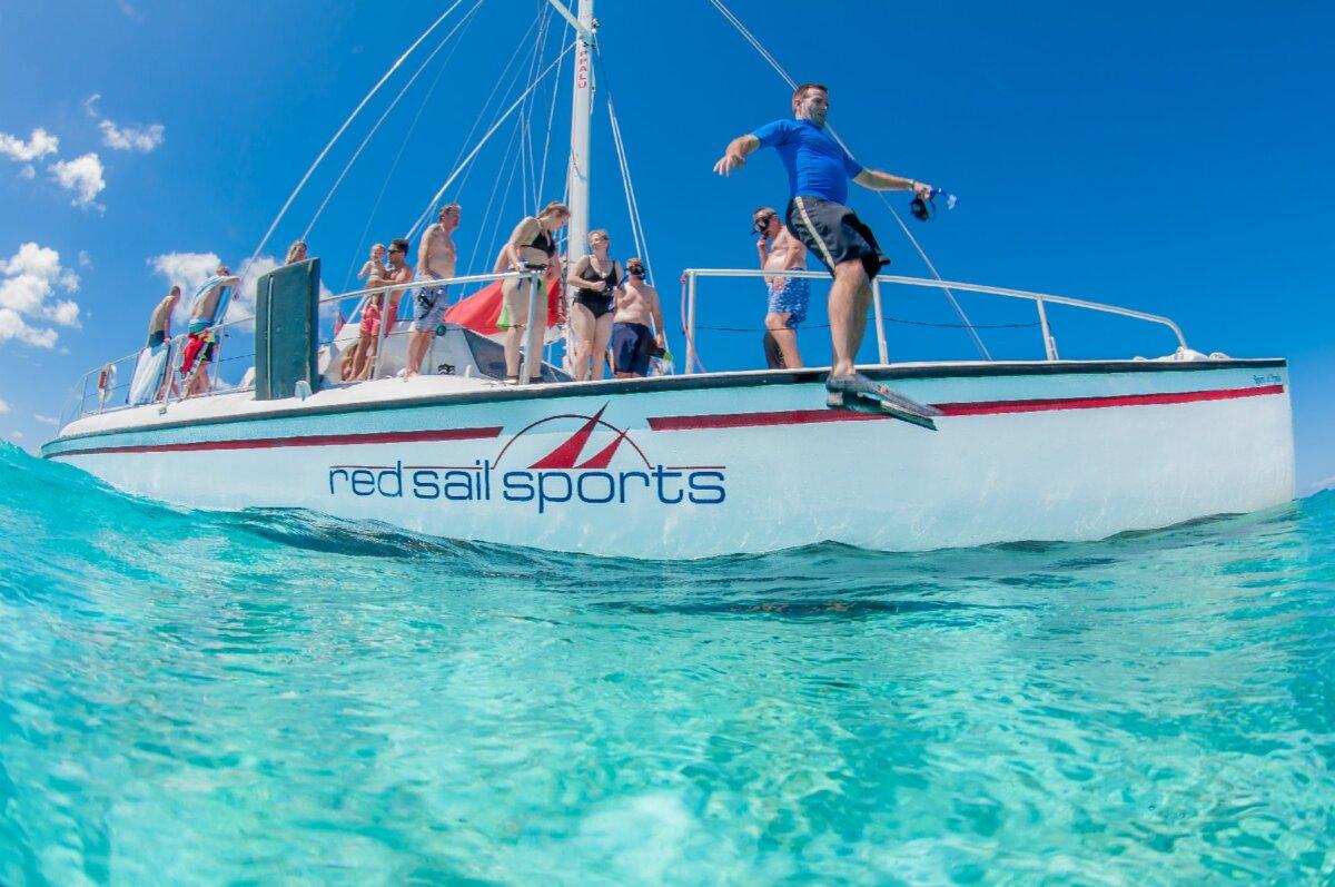 Visitors to the Cayman Islands prepare for some fun in the water. (Red Sail Sports)