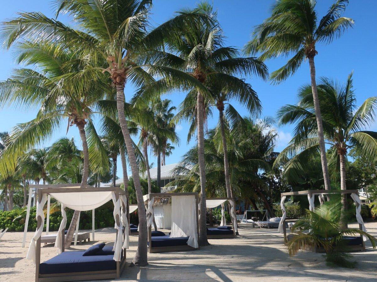 The chaise lounges at Kaibo Beach on Grand Cayman resemble comfortable beds. (Victor Block)