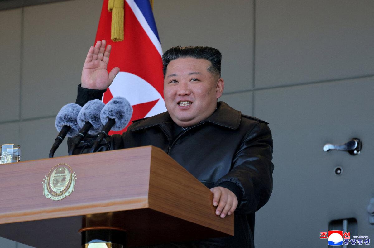 North Korean leader Kim Jong Un gestures as he visits a greenhouse farm construction site along the country's border with China, in North Korea, Jan. 2, 2026. (KCNA via Reuters)