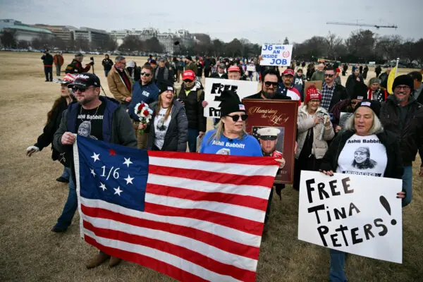 Day in Photos: Anniversary of Jan. 6, Protests in Israel, and Snow in Europe