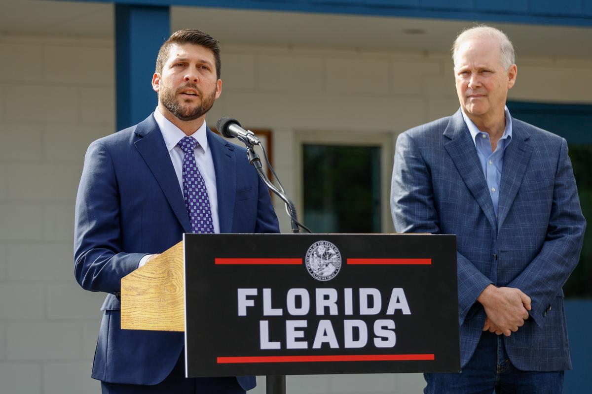 Florida Attorney General James Uthmeier (L) speaks about immigration enforcement operations at Baker Correctional Institution in Sanderson, Fla., on Jan. 5, 2026. (Natasha Holt/The Epoch Times)