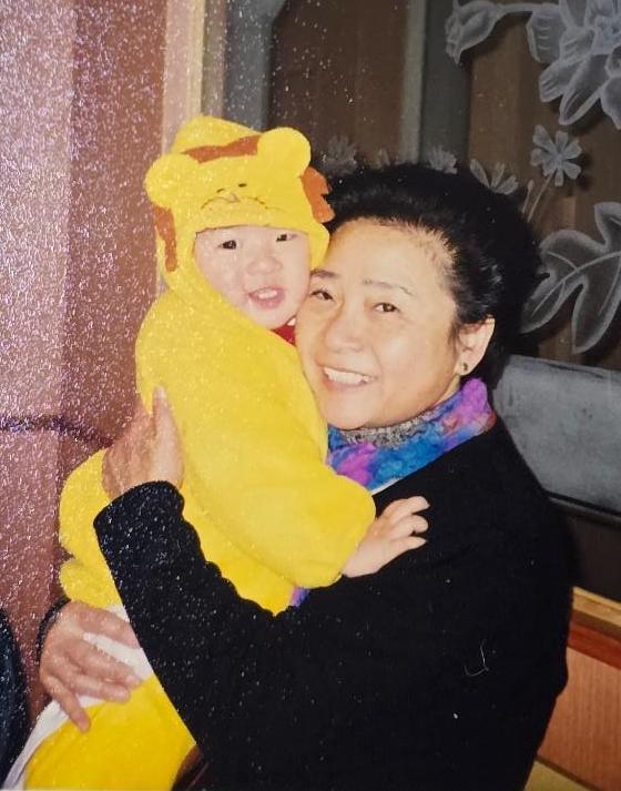 A young Kathy Wu with her maternal grandmother. (Courtesy of Rui Jun)
