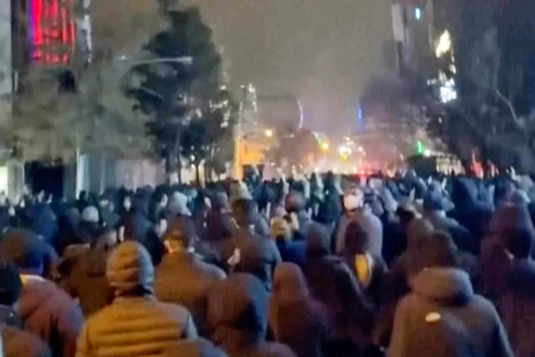 Protests Spread in Iran as Regime Vows to Retaliate Against Any US Attack