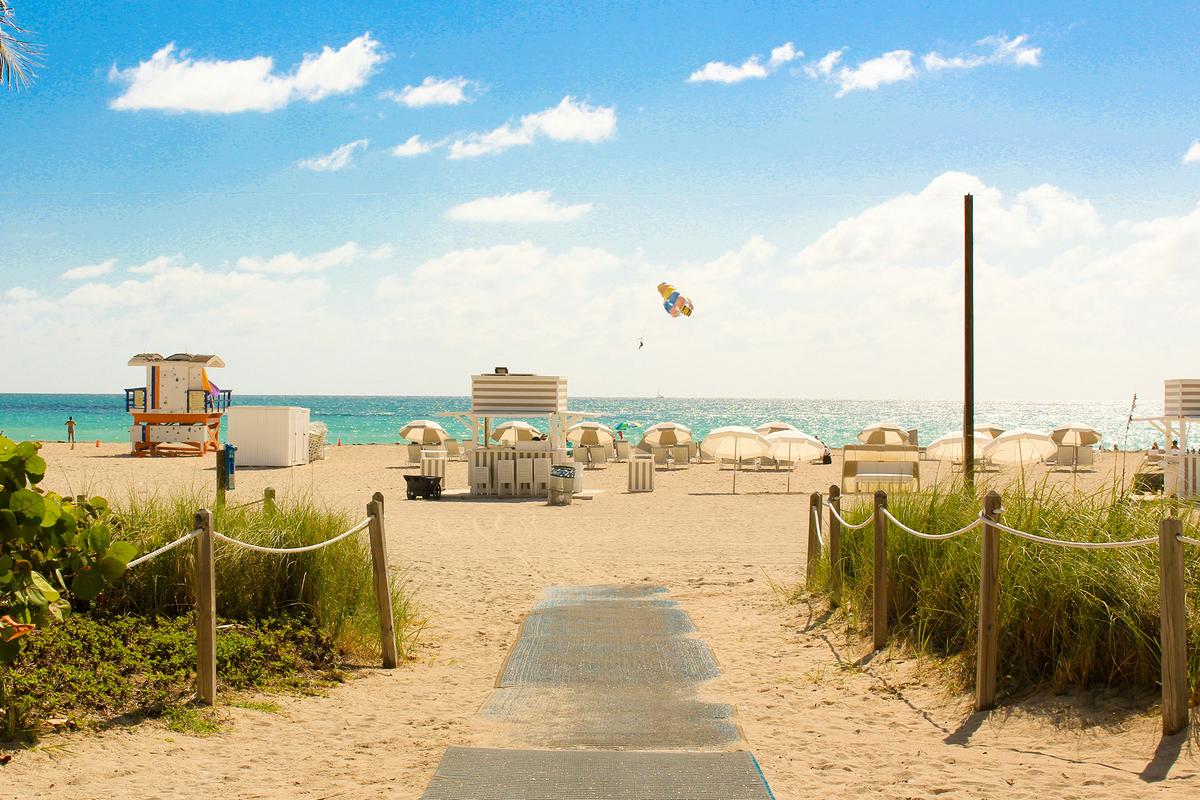 South Beach, a neighborhood in Miami Beach, is known for its white sand beaches and turquoise waters. (Joël de Vriend/Unsplash)