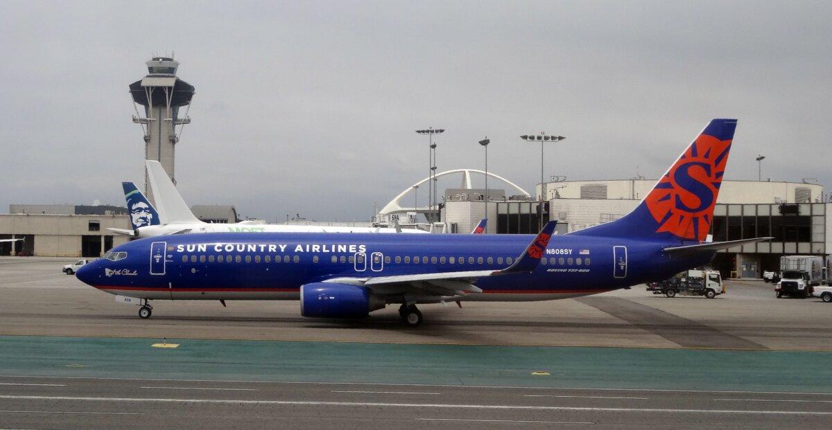 A Sun Country Airlines Boeing 737-800 jet taxis at Los Angeles International Airport. (Daniel Slim/AFP via Getty Images)