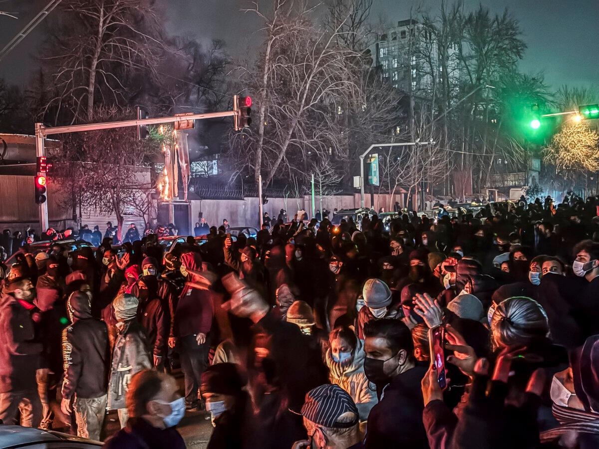 Iranians gather while blocking a street during a protest in Tehran, Iran, on Jan. 9, 2026. (MAHSA/Middle East Images via AFP via Getty Images)