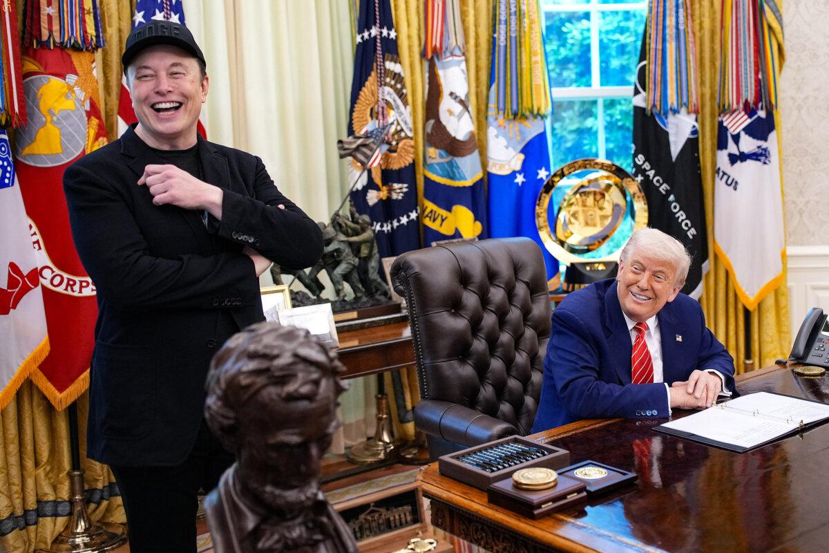 White House senior adviser Elon Musk and U.S. President Donald Trump laugh as they listen to a question from reporters in the Oval Office on May 30, 2025. (Kevin Dietsch/Getty Images)