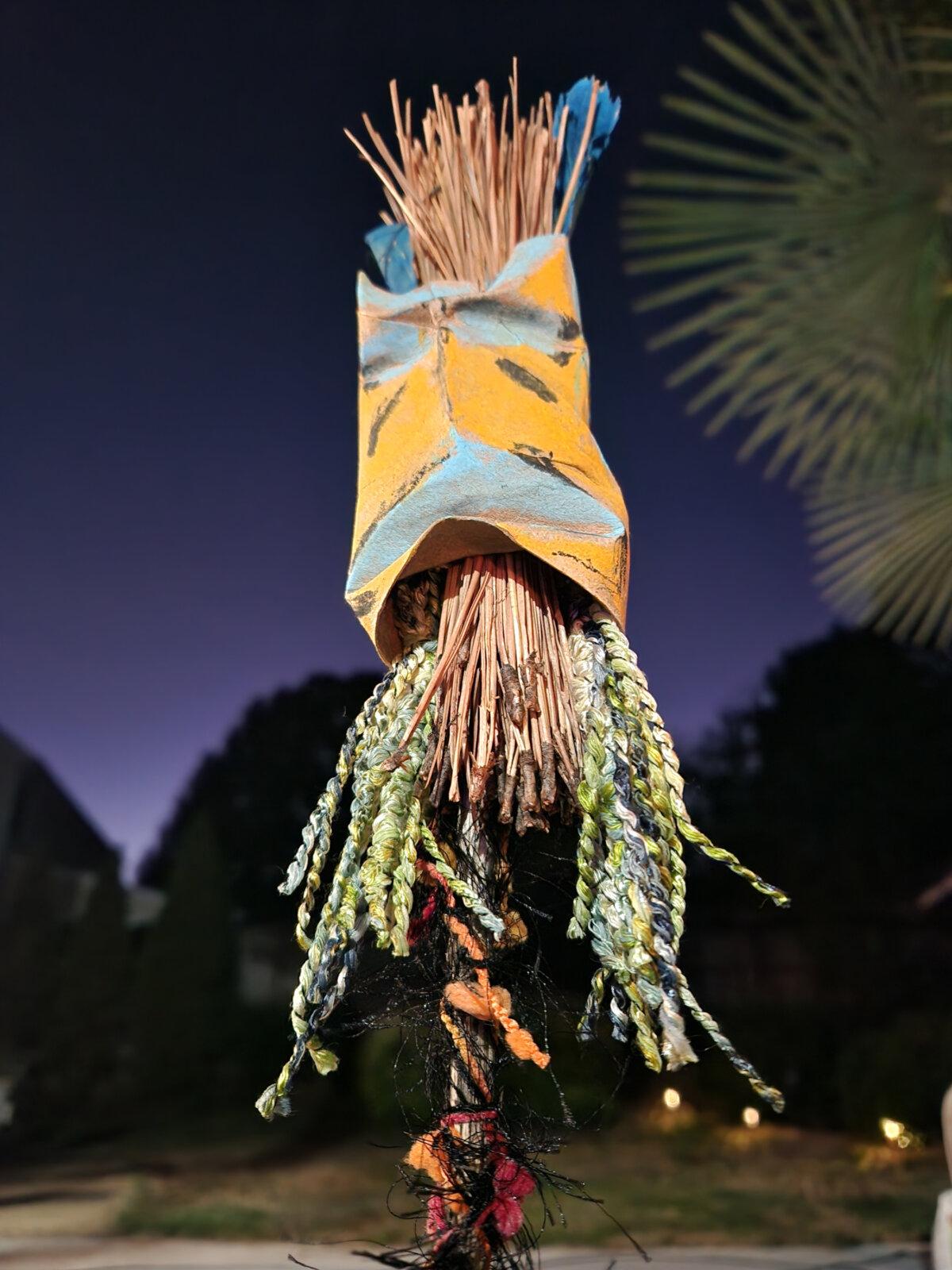 A tiki mask sculpted from a recycled cardboard tube makes for a fun vacation craft for travelers of all ages. (Myscha Theriault/TNS)