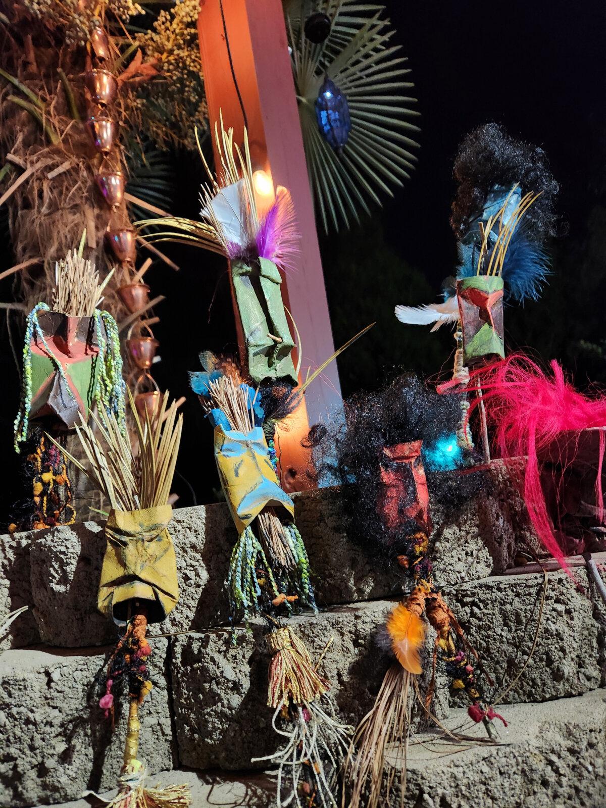 A group of inexpensive, homemade tiki totems lets travelers decorate for a pool party while on a family getaway. (Myscha Theriault/TNS)