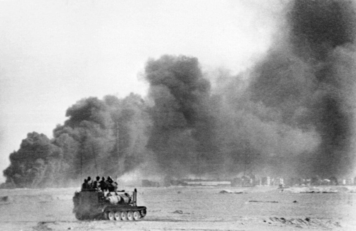 Israeli troops head toward the city of Suez in Egypt, where the oil refinery is burning, during the 1973 Arab–Israeli War, on Oct. 27, 1973. (AFP via Getty Images)