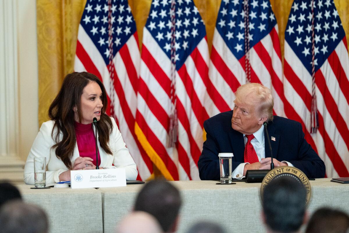 Agriculture Secretary Brooke Rollins and President Donald Trump during the "Great, Historic Investment in Rural Health Roundtable" in the East Room of the White House on Jan. 16, 2026. (Madalina Kilroy/The Epoch Times)