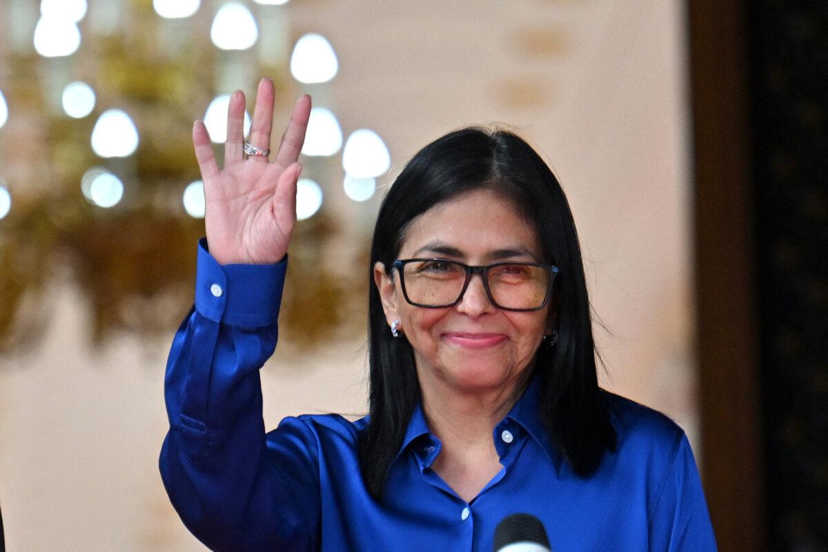 Venezuela's interim leader Delcy Rodríguez waves after a news conference at the Miraflores Presidential Palace in Caracas, Venezuela, on Jan. 14, 2026. (Juan Barreto/AFP via Getty Images)