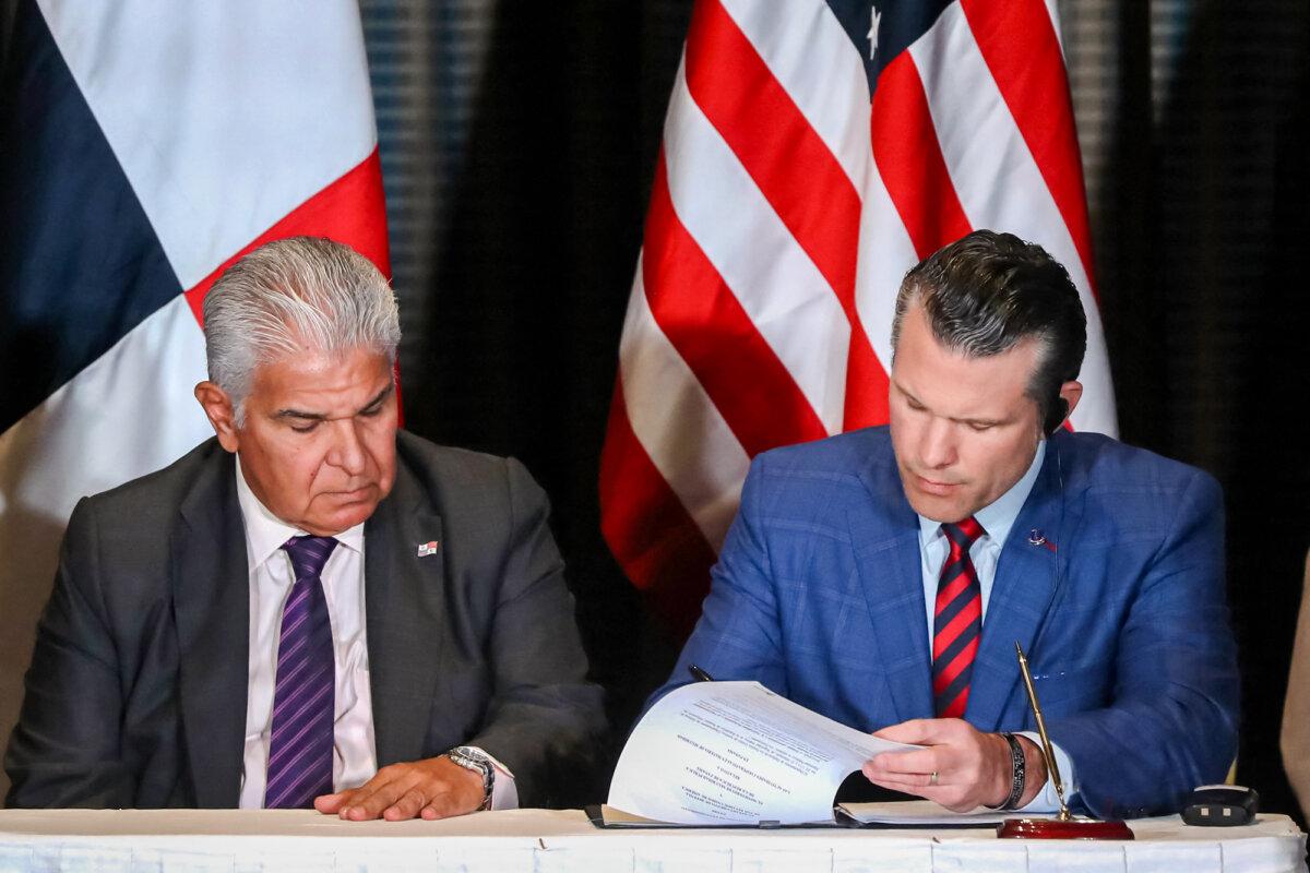Panamanian President José Raúl Mulino looks on as U.S. War Secretary Pete Hegseth signs a bilateral agreement in Panama City on April 9, 2025. (Franco Brana/AFP via Getty Images)