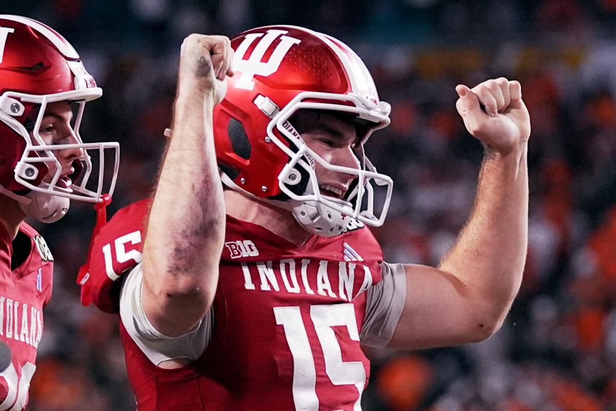 Indiana defensive lineman Mikail Kamara blocks a punt by Miami punter Dylan Joyce during the second half of the College Football Playoff national championship game in Miami Gardens, Fla., on Jan. 19, 2026. (Lynne Sladky/AP Photo)