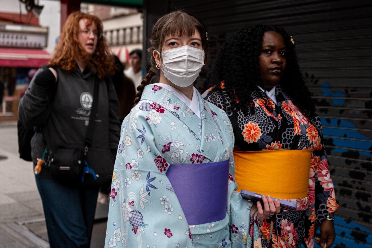 People visit a shopping street in the Asakusa district near Sensoji Temple, a popular tourist location in Tokyo, on Jan. 20, 2026. (Philip Fong/AFP via Getty Images)