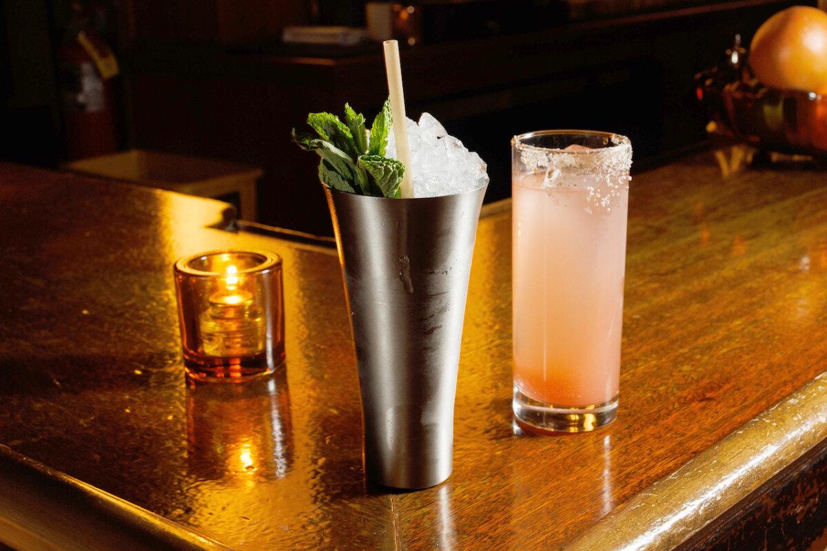 A bitter & bright, left, is a non-alcoholic drink with Pathfinder, Lucano, lemon, sweet vermouth and mint with another non-alcoholic drink named woodsy & bubbly with blanc vermouth, palo santo, grapefruit, sea salt and tonic at the bar at Friends of Friends, Jan. 12, 2026, in Chicago. (Armando L. Sanchez/Chicago Tribune)