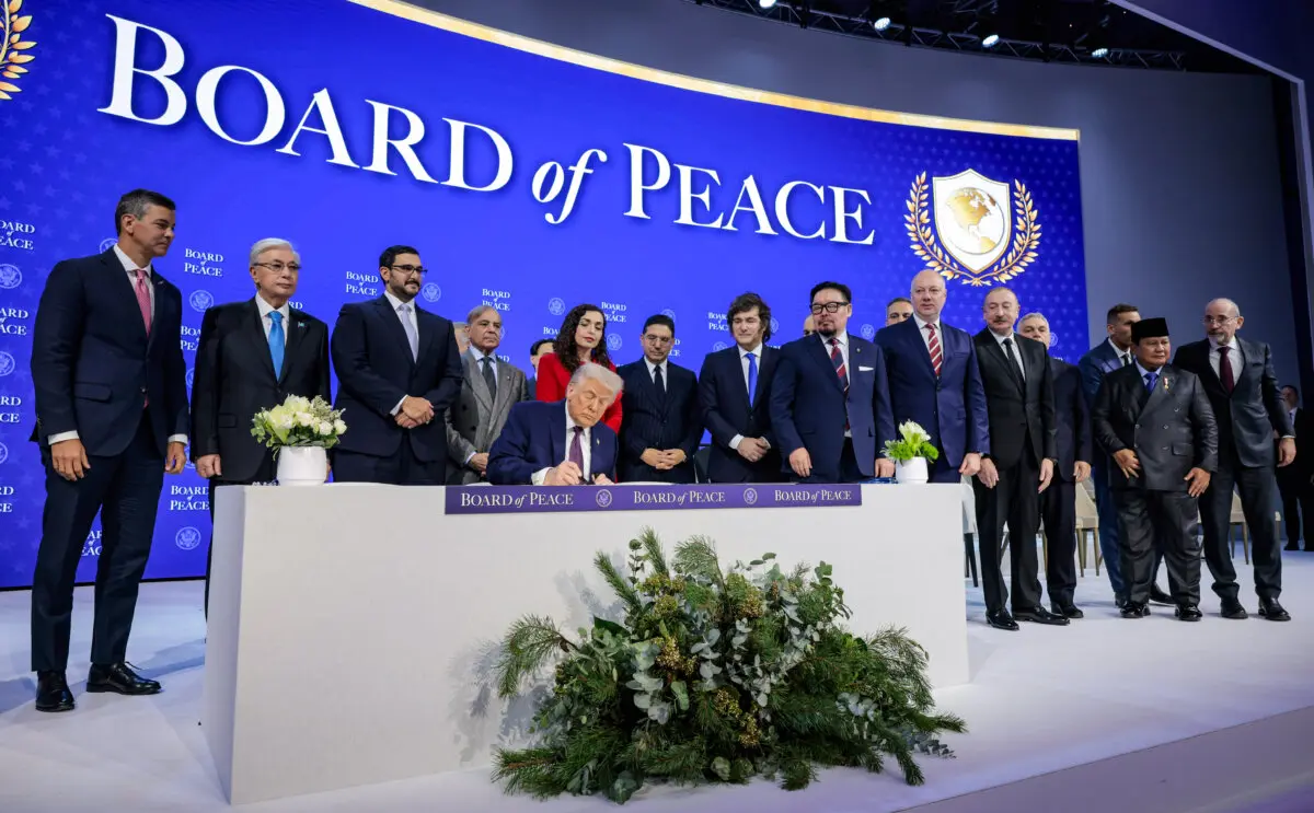 U.S. President Donald Trump holds a signing ceremony for the “Board of Peace” at the World Economic Forum (WEF) in Davos, Switzerland, on Jan. 22, 2026. (Chip Somodevilla/Getty Images)