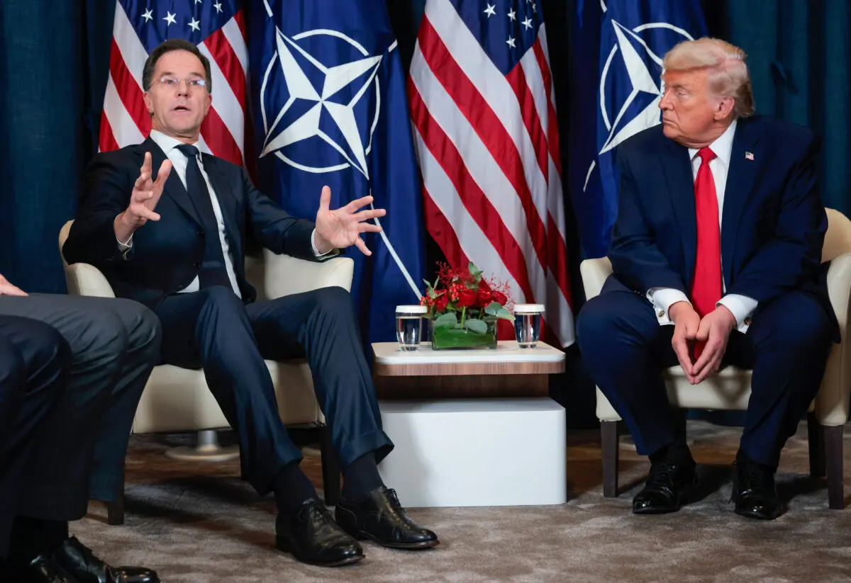 NATO Secretary General Mark Rutte (L) and U.S. President Donald Trump on the sidelines of the World Economic Forum, on Jan. 21, 2026, in Davos, Switzerland. (Chip Somodevilla/Getty Images)