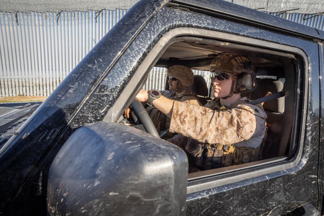 United States Marines (USMC) patrol the U.S/Mexico border near San Deigo, on Jan. 20, 2026. (John Fredricks/The Epoch Times)