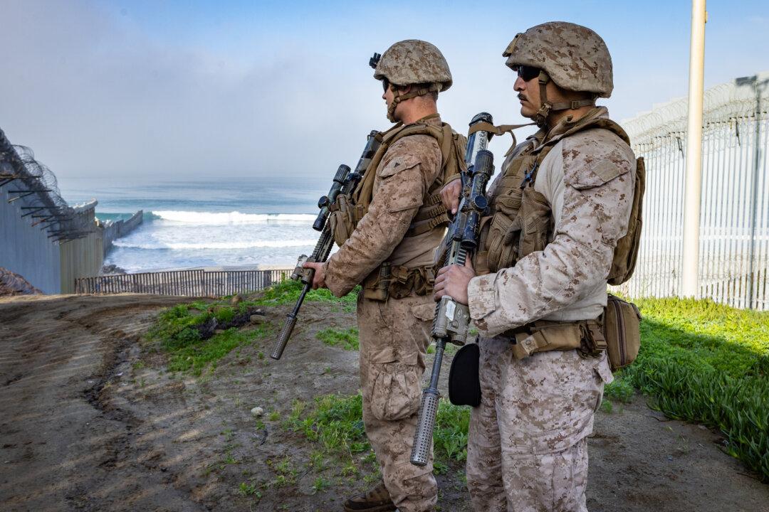 United States Marines (USMC) patrol the U.S/Mexico border near San Deigo, on Jan. 20, 2026. (John Fredricks/The Epoch Times)