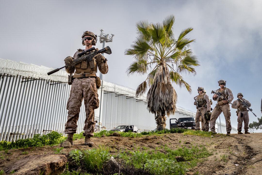 United States Marines (USMC) patrol the U.S/Mexico border near San Deigo, on Jan. 20, 2026. (John Fredricks/The Epoch Times)