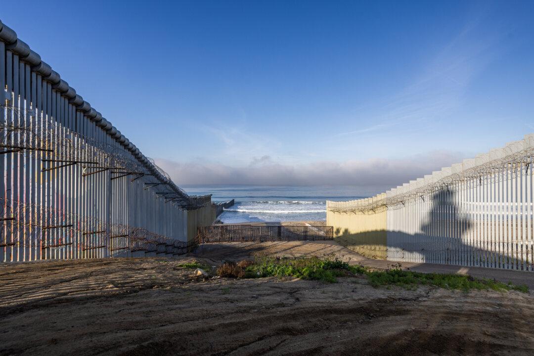 The Pacific ending of the United States border wall seen from outside of San Diego, on Jan. 20, 2026. (John Fredricks/The Epoch Times)