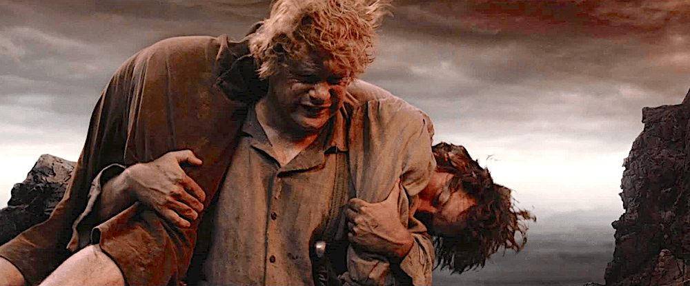 Samwise Gamgee (Sean Astin, L) carries his friend, Master, and charge, Frodo Baggins (Elijah Wood) up the slopes of Mt. Doom, in "The Lord of the Rings: The Return of the King." (New Line Cinema)