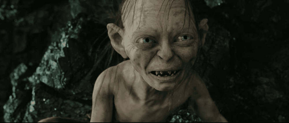 Ring-junkie Gollum (Andy Serkis), tempts Frodo into a giant spider's lair, in "The Lord of the Rings: The Return of the King." (New Line Cinema)