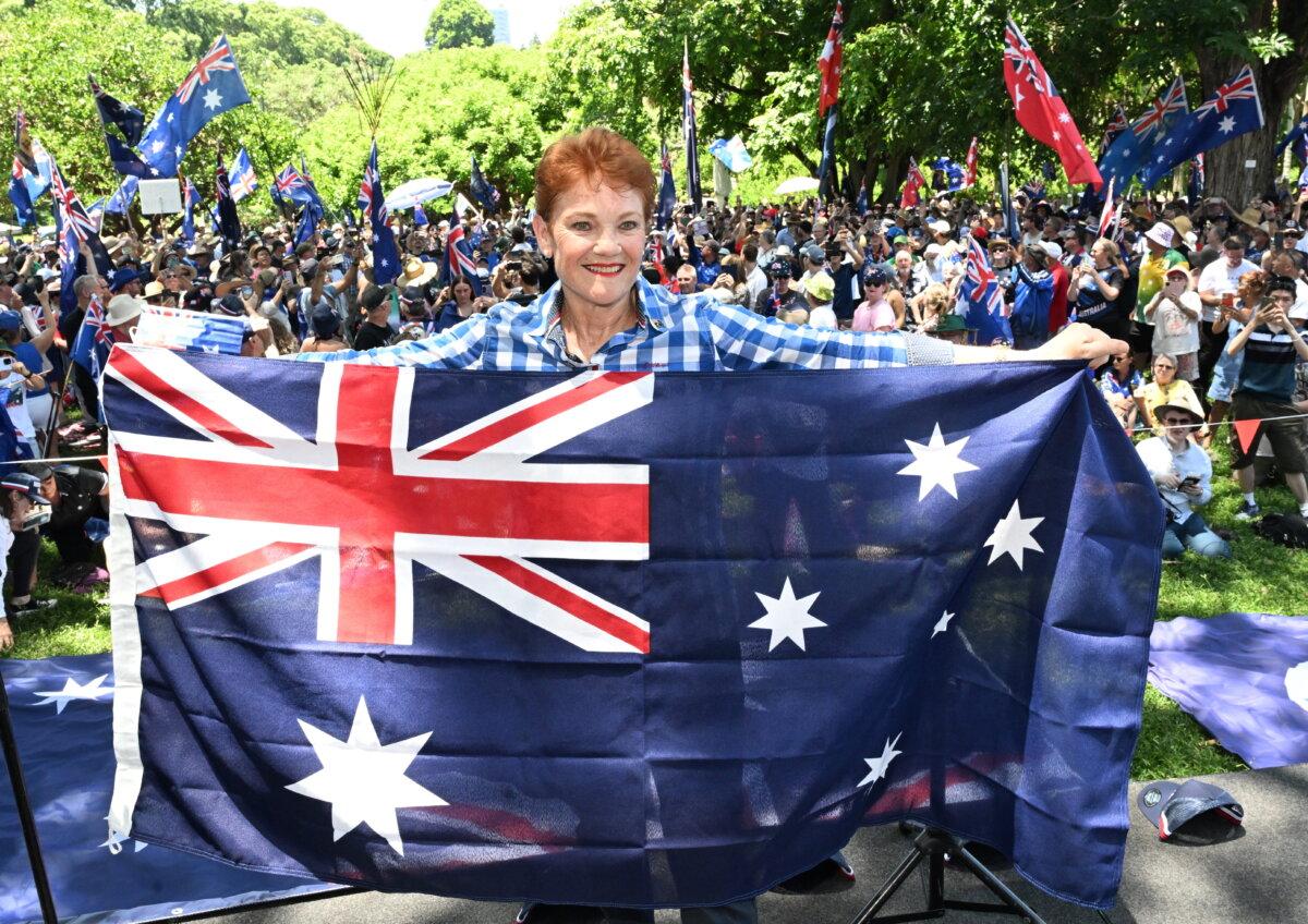 One Nation Leader Senator Pauline Hanson is seen with people attending the Australia Marches rally during Australia Day celebrations in Brisbane, Australia on Jan. 26, 2026. (AAP Image/Darren England )
