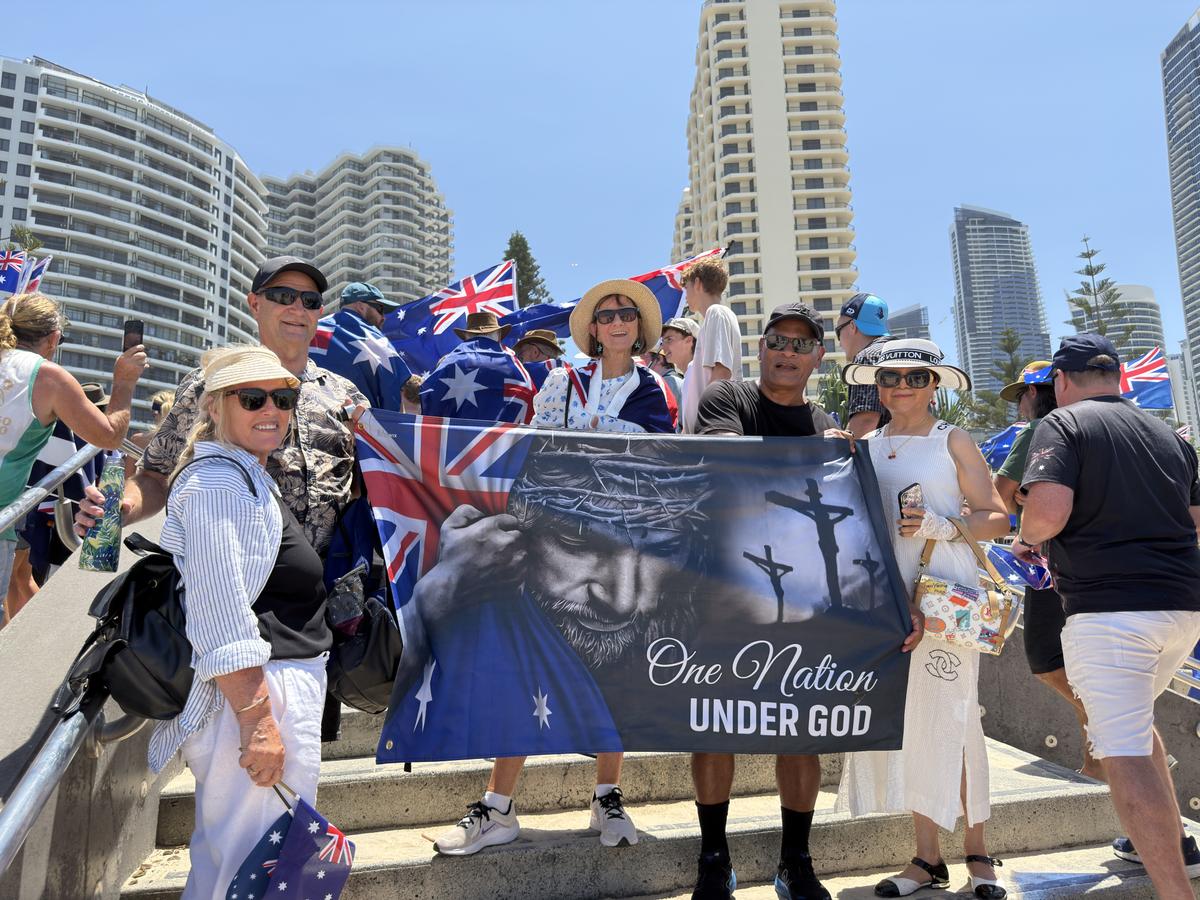 Australians holding a banner while attending the March for Australia rally on the Gold Coast, Australia on Jan. 26, 2026. (Courtesy of Anna Nguyen)