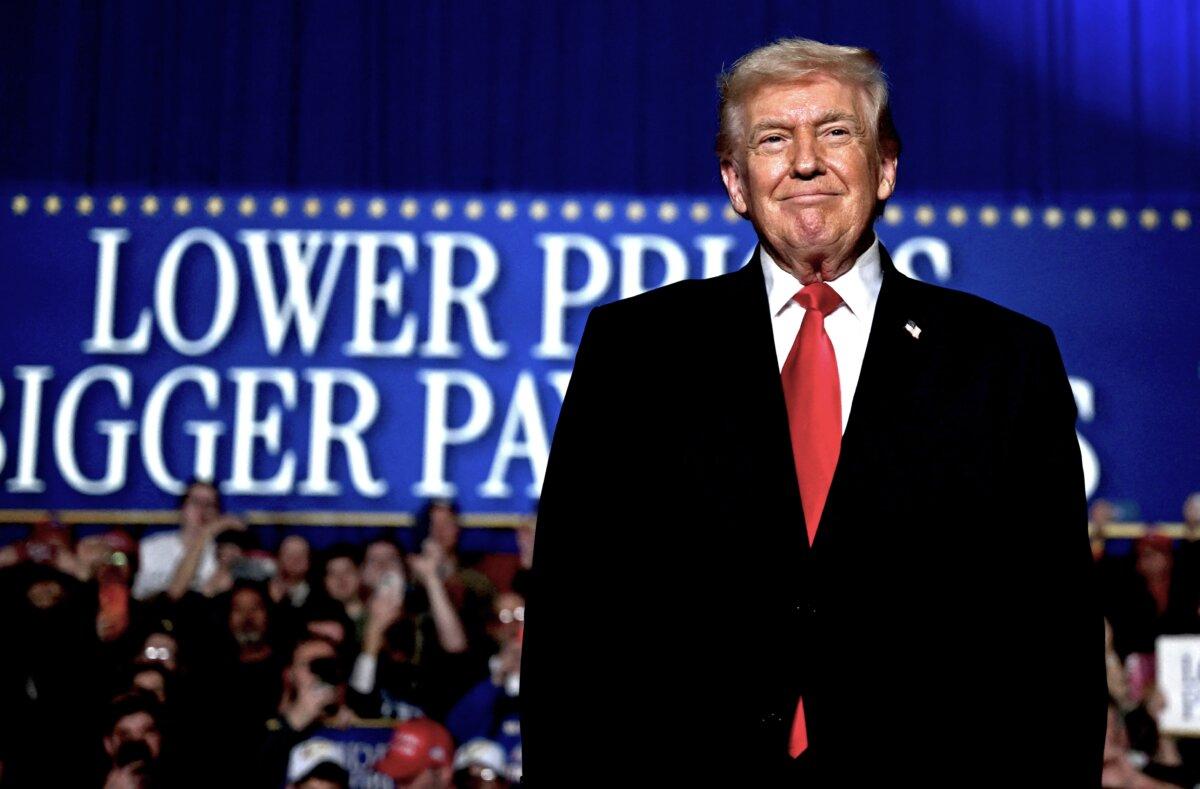President Donald Trump arrives to deliver remarks on the economy in Clive, Iowa, on Jan. 27, 2026. (Brendan Smialowski/AFP via Getty Images)