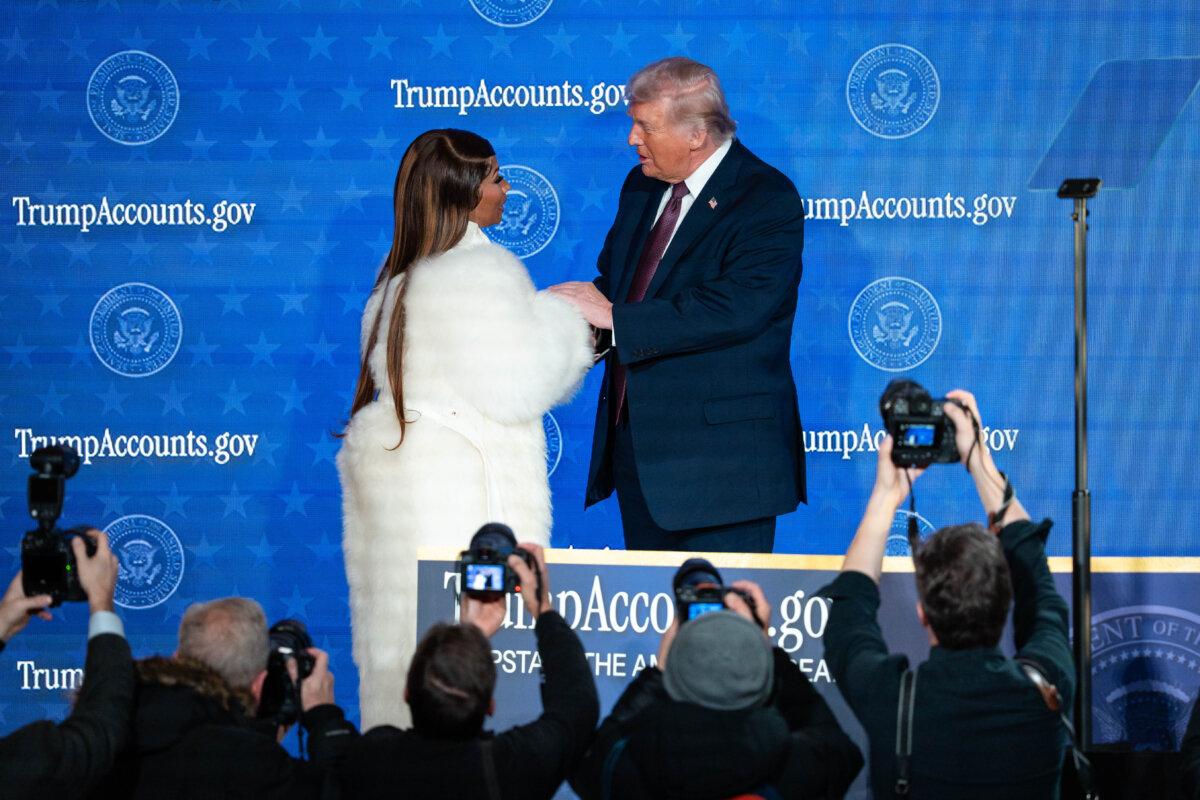 Musician Nicki Minaj and President Donald Trump during the Trump Accounts summit at the Andrew W. Mellon Auditorium in Washington on Jan. 28, 2026. (Madalina Kilroy/The Epoch Times)