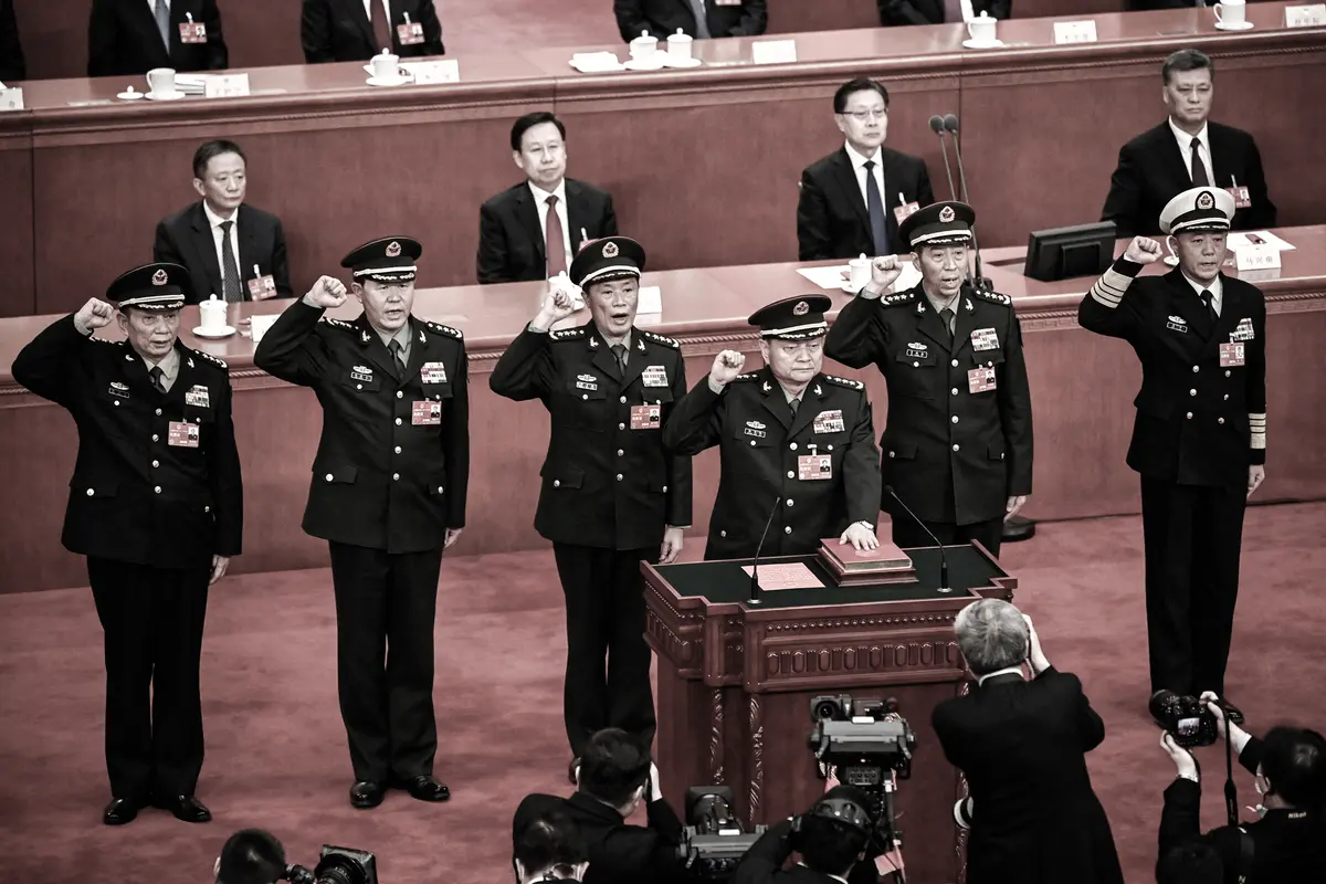 Zhang Youxia (front) swears an oath with members of the Central Military Commission after their election during the fourth plenary session of the National People’s Congress at the Great Hall of the People in Beijing on March 11, 2023, most of whom have since been purged. (Greg Baker/Pool/AFP via Getty Images)