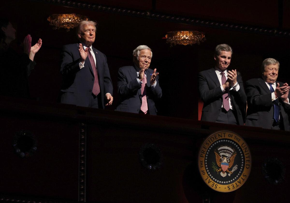 President Donald Trump (L) and New England Patriots owner Robert Kraft (2nd L) greet attendees during a screening of the documentary film “Melania” at The Trump Kennedy Center in Washington on Jan. 29, 2026. (Samuel Corum/Getty Images)