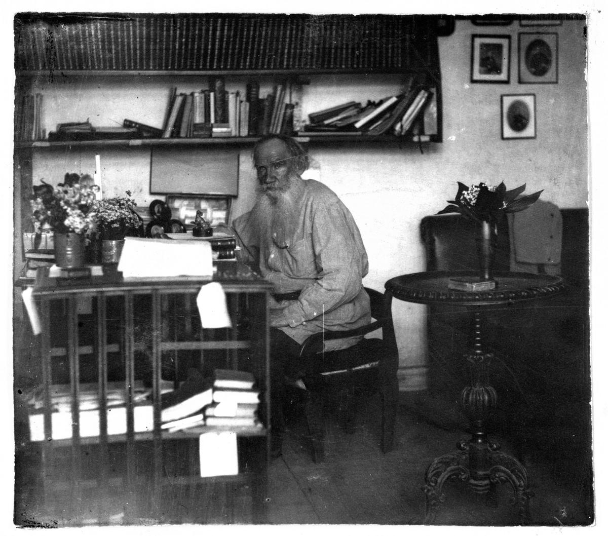 Leo Tolstoy working in his office in Yasnaya Polyana, Russia, near Moscow, in 1908. (Public domain)