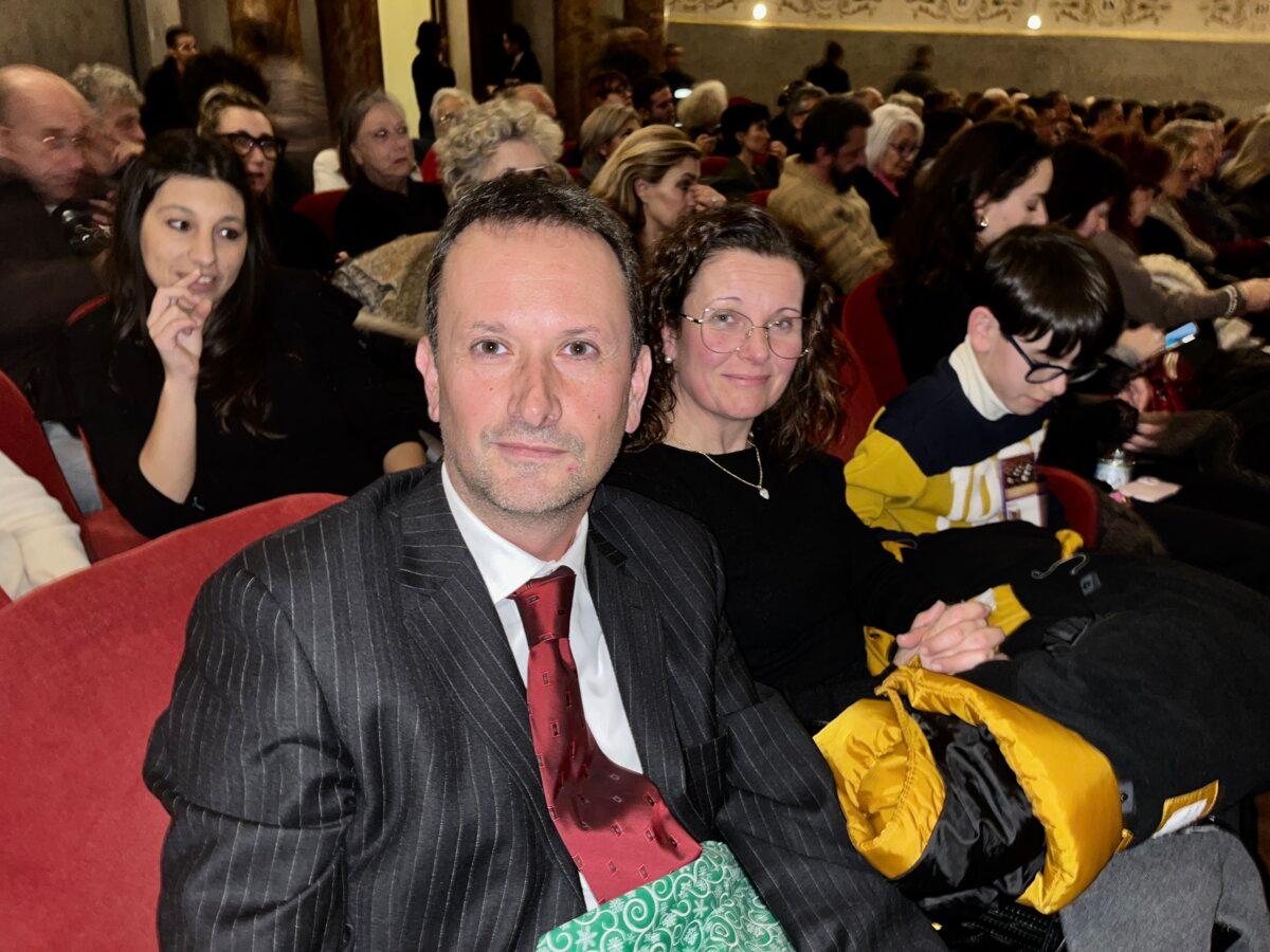 Luca Andreini, manager of a public health organization, attends the second performance of Shen Yun New York Company at Teatro Goldoni with family members on Jan. 28, 2026. (Leo Botnarenko/The Epoch Times)