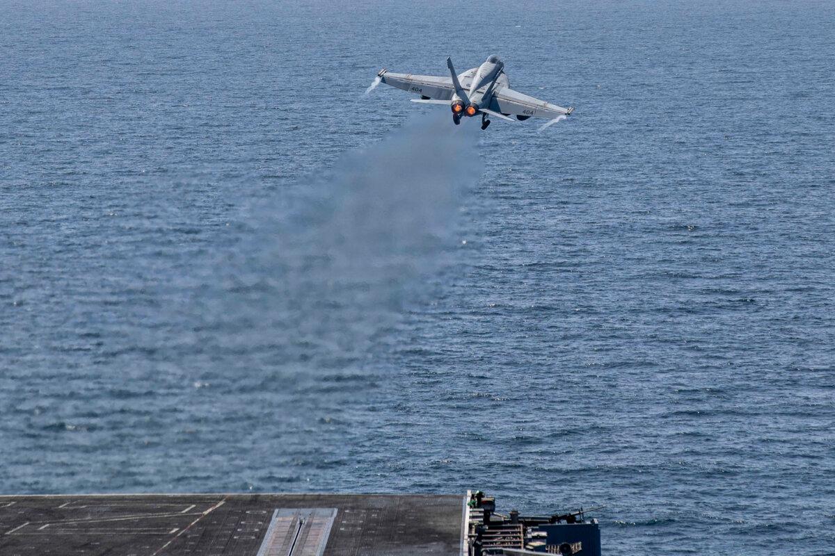 An F/A-18E Super Hornet, attached to Strike Fighter Squadron (VFA) 151, takes off from the flight deck of Nimitz-class aircraft carrier USS Abraham Lincoln in support of Operation Epic Fury, on Feb. 28, 2026 at Sea. (U.S. Navy via Getty Images)