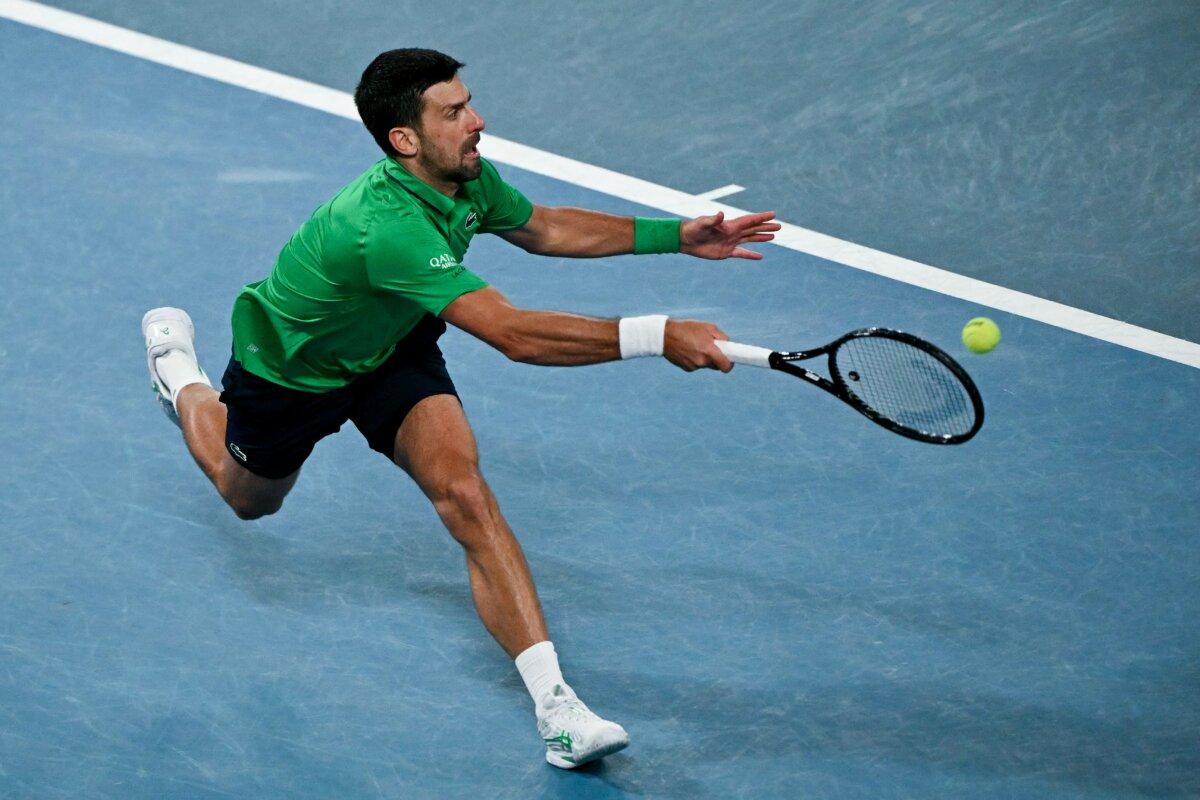 Novak Djokovic hits a return to Carlos Alcaraz during their men's singles final match at the Australian Open in Melbourne on Feb. 1, 2026. (William West/AFP via Getty Images)