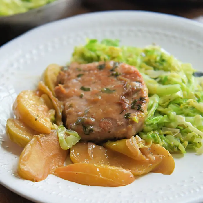 1-Pot Recipe Brings Together Pork Chops, Apples, and Warm Cabbage Slaw
