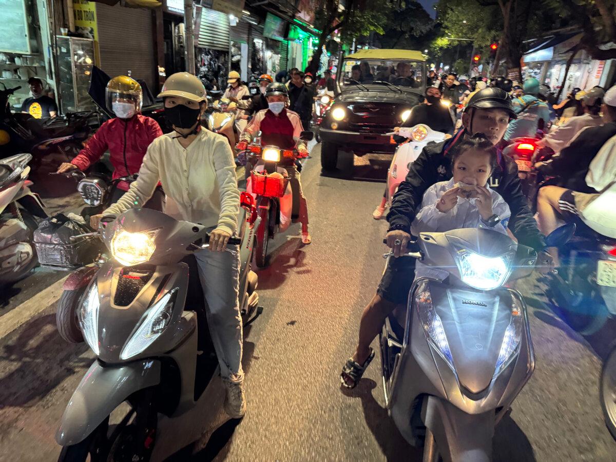 Swarms of motorbikes fill the streets of Hanoi. (Lori Rackl/TNS)