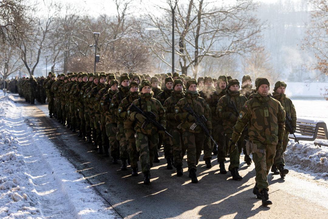 KAUNAS, LITHUANIA - FEBRUARY 4: Norway troops march during a public ceremony to mark the expansion of Germany's Lithuania military commitment on February 4, 2026 in Kaunas, Lithuania. Germany leads a multi-national, NATO contingent in Lithuania with its Lithuania Armoured Brigade 45. The unit was recently expanded to include two additional armoured infantry battalions. Germany is building a new military base in southeastern Lithuania that will accommodate up to 5,000 personnel. (Photo by Paulius Peleckis/Getty Images)