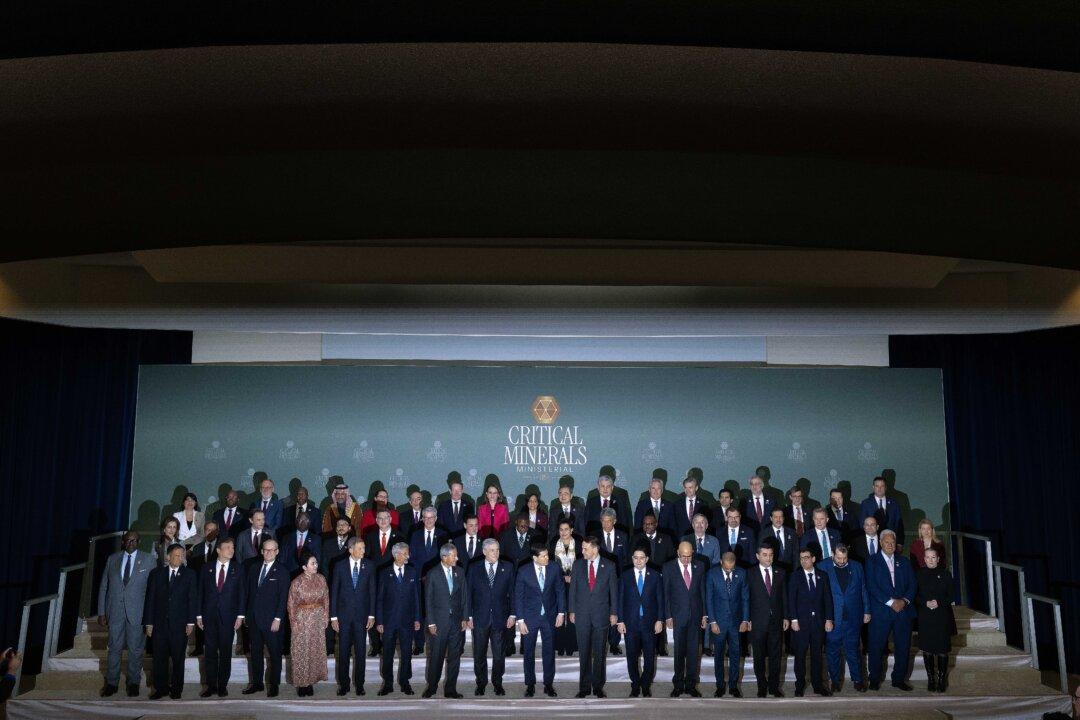 WASHINGTON, DC - FEBRUARY 04: U.S. Secretary of State Marco Rubio (C) poses for a "family photo" with the 55 government officials who were invited to the first Critical Minerals Ministerial in the Dean Acheson Auditorium at the State Department's Harry S. Truman Building on February 04, 2026 in Washington, DC. About 50 countries attended the ministerial, a gathering to discuss the creation of tech supply chain partnerships that can bypass China. The United States has been looking for alternative sources for rare earth minerals since Beijing cut the U.S. off from its supply last year. (Photo by Chip Somodevilla/Getty Images)